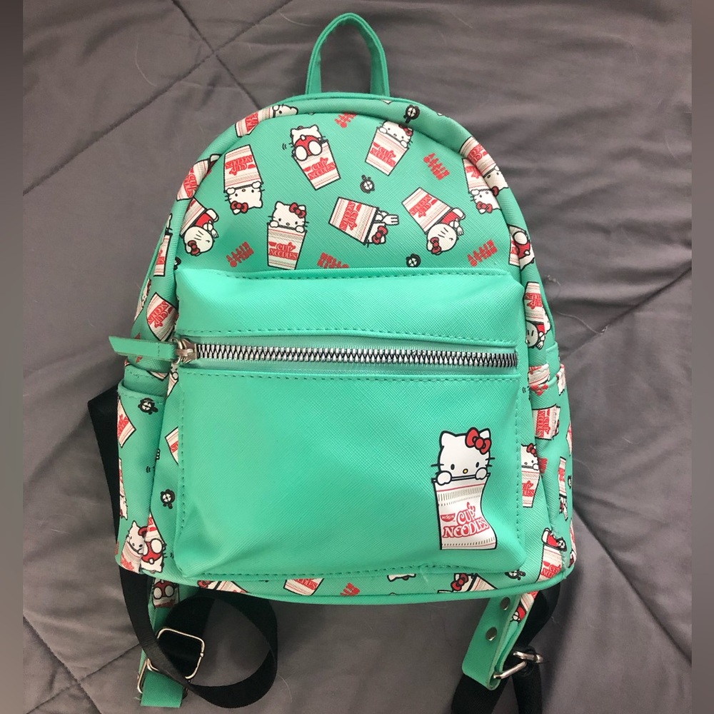 ISSI Green and Red Bag with Vibrant Design